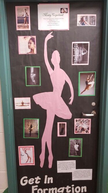 a door decorated with pink and black paper cut outs that says, get in formation