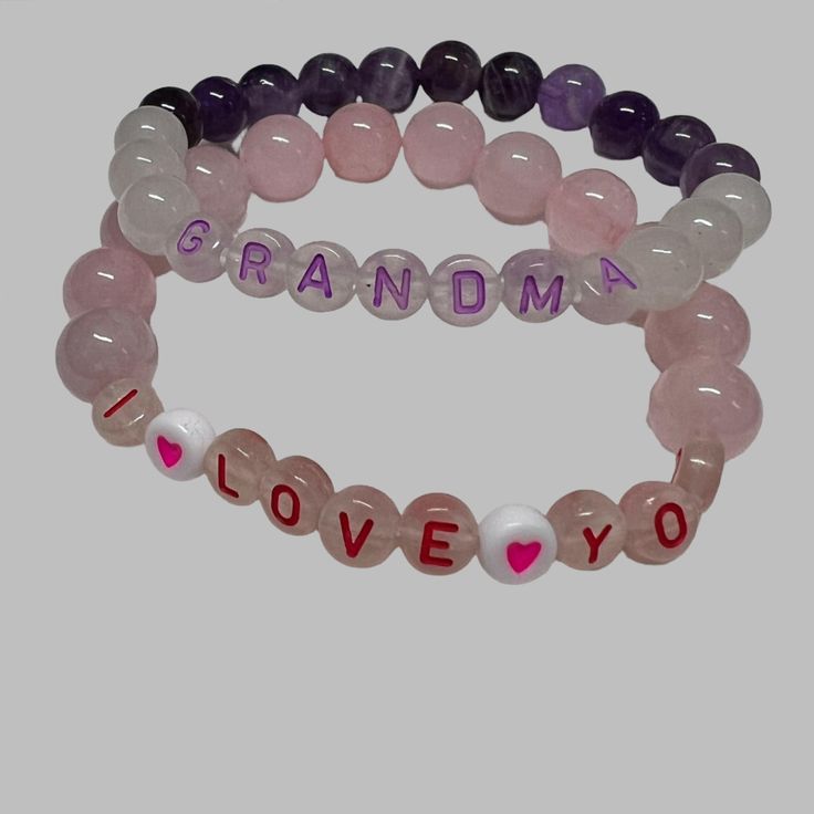 Celebrate the special bond between mother and child with our Mother's Day Bracelet! Made with 6mm or 8mm gemstone beads, this bracelet is a perfect way to show your love and appreciation. Give a meaningful gift that will be cherished for years to come. Spiritual Pink Jewelry For Birthday, Gift Birthstone Bracelets With Round Beads, Birthstone Bracelets With Round Beads For Gifts, Pink Bracelets For Mother's Day, Round Bead Birthstone Bracelets For Gifts, Round Beaded Birthstone Bracelets For Gifts, Round Beads Birthstone Bracelets For Gifts, Purple Round Beaded Jewelry For Mother's Day, Adjustable Pink Name Bracelet With 8mm Beads