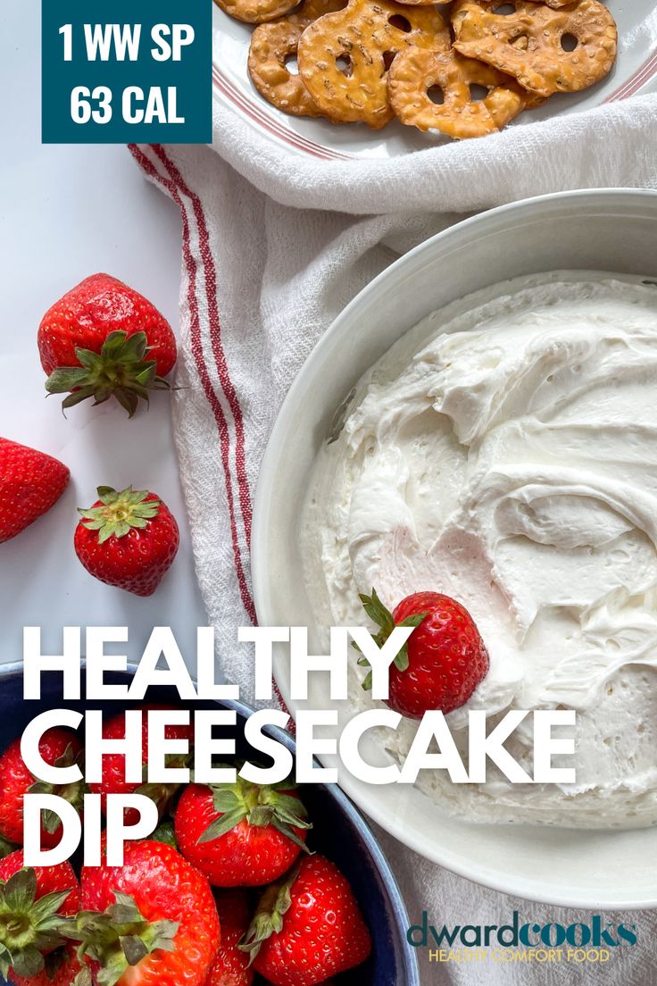 healthy cheesecake dip with fresh strawberries and crackers on the side for dipping