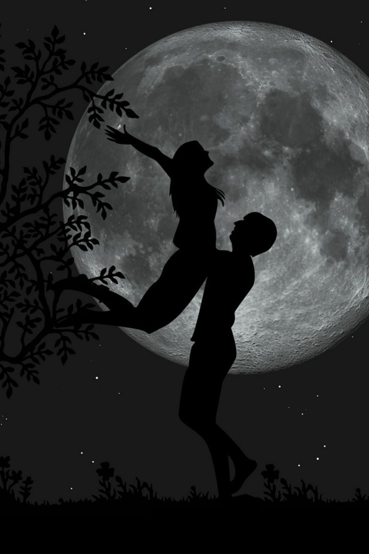 two people are silhouetted against the moon in this black and white photo, one is holding