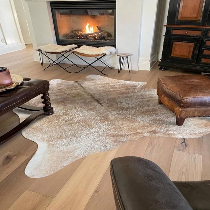 a living room with a fire place in the fireplace