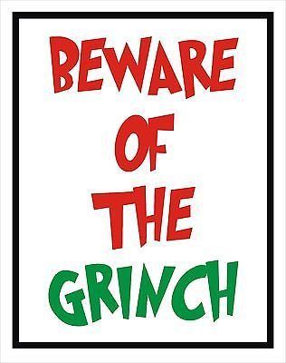 a sign that says beware of the grunch in red, green and black