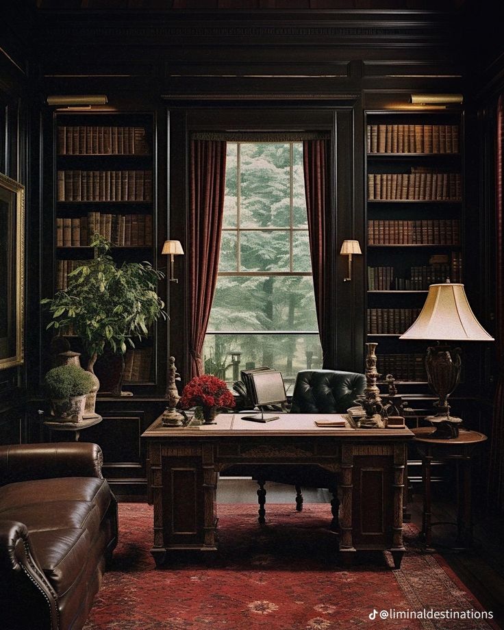 a room with a desk, chair and bookshelf filled with lots of books