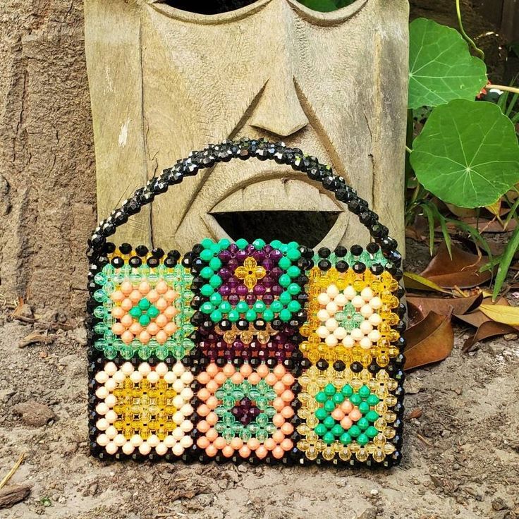 Colorful bag with crochet square pattern Trendy Handmade Rectangular Crochet Bag, Green Rectangular Crochet Bag, Vintage Square Crochet Bag Handmade, Vintage Handmade Square Crochet Bag, Trendy Handmade Square Box Bag, Green Square Crochet Bag, Handmade Green Rectangular Bag, Rectangular Granny Square Crochet Bag As Gift, Vintage Multicolor Rectangular Shoulder Bag