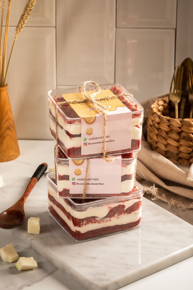 three pieces of cake sitting on top of a counter