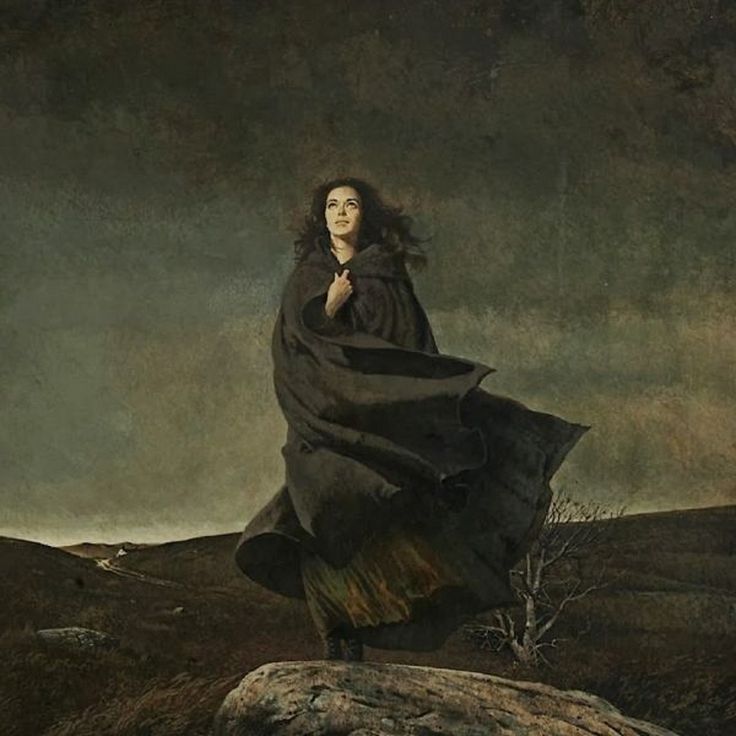 a painting of a woman standing on top of a hill