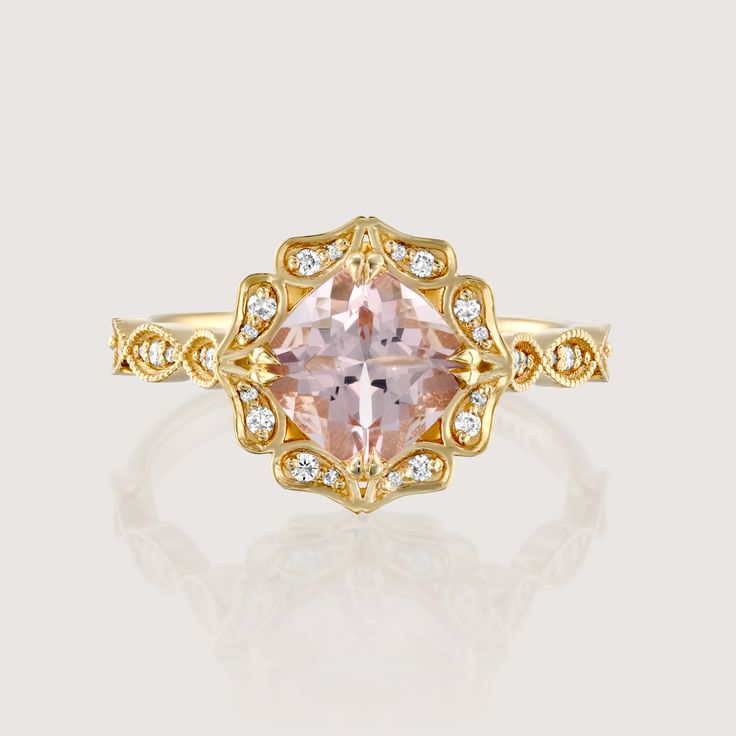 with an antique touch and a royal presence this ring is for a real princess. The center stone is a breathtaking morganite with a pinkish glow to it held by 8 magnificent claws. The stone is surrounded by 12 dazzling white diamonds set exquisitely in paisley like gold shapes. The band is waivy gold, dotted and encrusted with diamonds as well. This ring is just heart stopping from every angle. All features can be customized! please contact us if you wish to make changes, we love making custom designs. All of our jewelry is carefully handmade in our atelier *HC diamond are all conflict free diamonds To order by phone click here>> +972(0)722991000 Luxury Morganite Rings For Anniversary, Luxury Morganite Diamond Ring For Anniversary, Exquisite Morganite Diamond Ring For Anniversary, Morganite Diamond Ring With Accent Stones, Wedding Pink Topaz Ring With Diamond, Formal Pink Gold Ring With Center Stone, Gold Morganite Gemstone Diamond Ring, Pink Topaz Wedding Ring With Diamonds, Elegant Pink Birthstone Ring With Diamond Accents