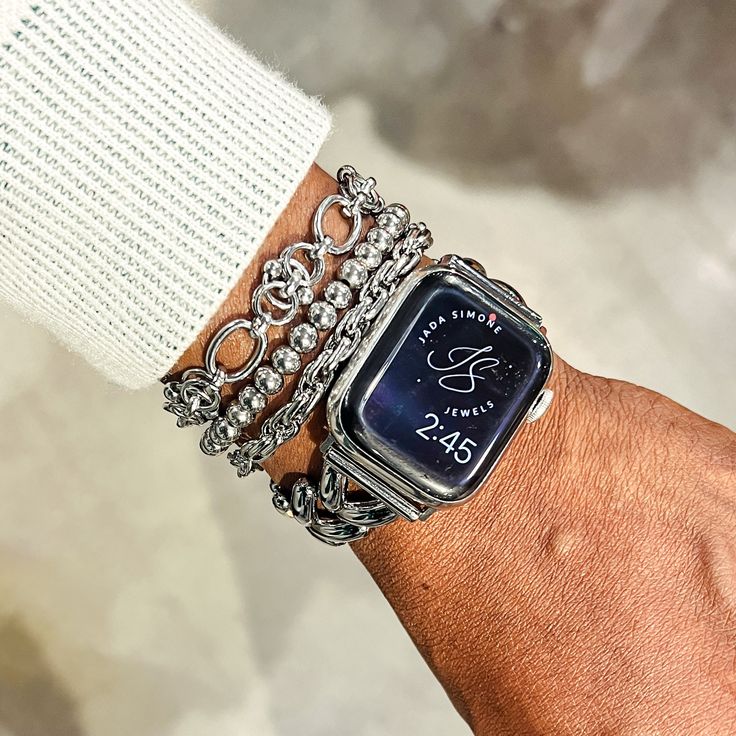 Step out in style with the Anaise Stainless Steel Bracelet Stack! This stack features 3 stainless steel bracelets and an optional Apple watch band, perfect for adding a touch of elegance and functionality to any outfit. Upgrade your wrist game and make a statement with this unique and versatile bracelet stack. Product DetailsMaterial: Stainless SteelSize: S/M 7 inches or L/XL 8 inches Select option with Watch Band to also include Viviana Apple Watch Band (Apple watch is NOT included) Bracelet si How To Stack Bracelets With Watch, Bracelet Stack With Apple Watch, Bracelets With Apple Watch, Alex And Ani Bracelets Stacked With Apple Watch, Silver Apple Watch Band With Bracelet Strap, Apple Watch Bracelet Stack, Timeless Stainless Steel Apple Watch Bracelet Strap, Timeless Stainless Steel Bracelet Strap Apple Watch Band, Stainless Steel Bracelet Strap Apple Watch Band