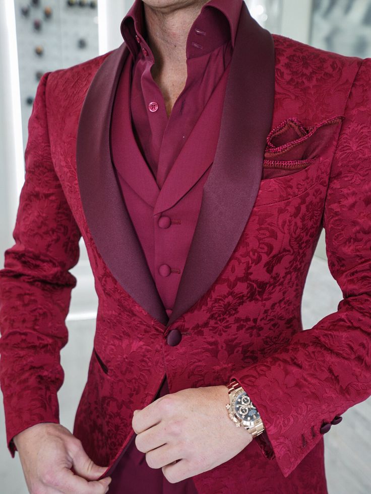 So excited 🤩 to introduce the all new Burgundy Fiore Look 🙌 This was another one of our 2021 resolutions, which we quietly launched after Christmas! Very proud to have this piece offered to you today 😊 #sebastiancruzcouture #burgundysuit #suitoftheday #threepeicesuit #mensfashion #bespoke #pocketsquare #menswear #highcollarshirt #lookoftheday #menwithclass #luxurymenswear #menssuits #trend #gentlemen #burgundy #suit #fashion #style #rolexdaytona Elegant Tuxedo With Lapel Collar And Button Closure, Elegant Semi-formal Tuxedo With Button Closure, Elegant Burgundy Blazer For Party, Wedding Outerwear With Lapel Collar And Single Button, Elegant Fitted Burgundy Tuxedo, Elegant Burgundy Fitted Tuxedo, Elegant Burgundy Party Blazer, Elegant Fitted Burgundy Blazer, Elegant Burgundy Suit For Party