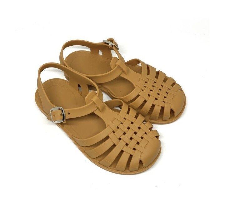 Australian designed jelly sandals super cute, super comfortable, perfect sand shoes for the beach. Easy to get all sand off. Comes in three colours terracotta, navy and khaki. Trendy Beige Jelly Sandals With Round Toe, Casual Beige Closed Toe Jelly Sandals, Beige Closed Toe Jelly Sandals For The Beach, Casual Beige Flat Jelly Sandals, Beige Closed Toe Jelly Sandals, Casual Beige Jelly Sandals For Beach, Beige Casual Jelly Sandals For The Beach, Casual Beige Jelly Sandals For Vacation, Non-slip Summer Jelly Sandals For Vacation