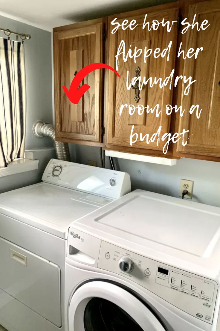 a washer and dryer in a small room with wooden cabinets above the washer