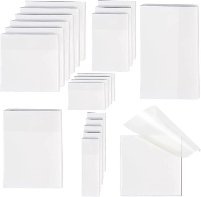 white blank cards and envelopes are arranged on a white background with one folded in the middle