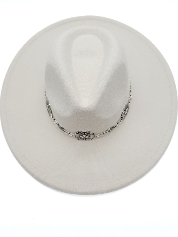 Carry your spirit with you wherever you go when you wear this fedora hat. A playful chain detail and flat brim make it easy to pair with any outfit, while an adjustable strap inside ensures that it fits perfectly. Made of felt, this hat is both practical and stylish! Fedora hat Chain strap detail Flat brim Adjustable inside One size fits most Felt material Crown height 4.5" Brim 3.5" Trendy Curved Brim Fedora For Festival, Trendy Curved Brim Felt Hat For Festivals, Trendy Short Brim Felt Hat For Festivals, Trendy Flat Brim Fedora For Festival, Trendy Adjustable Fedora With Flat Crown, Chic Adjustable Fedora For Rodeo, Chic Adjustable Fedora For Festivals, Trendy Wide Brim Felt Hat For Festivals, Trendy Flat Brim Fedora For Country Events