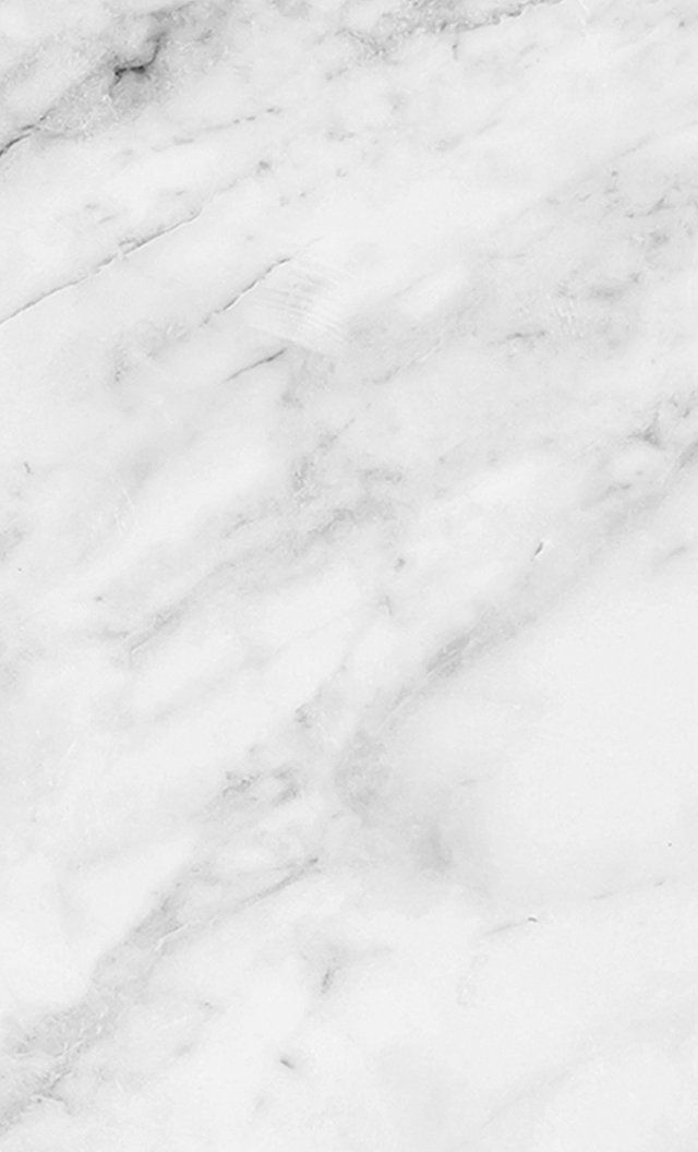 a black and white photo of a marble floor