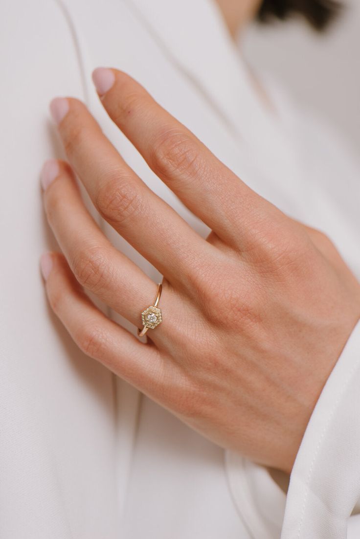 From the pavé halo around the outer edge, to the delicate milgrain detail, down to the timeless centre stone - this dainty beauty is sure to be noticed. Available in 14k white, yellow, and rose gold Post-Consumer Recycled Diamonds ~.171tcw Made in Toronto, Canada Each piece is made-to-order with care and special attention to detail. Please allow 3-5 weeks for items to ship. For ring sizes larger than 9, please contact us at eden@edenphilippa.com. Delicate Diamond Jewelry With Halo Setting, Wedding 14k Gold Halo Ring, Delicate Yellow Gold Diamond Ring With Halo Setting, Delicate 14k Gold Diamond Ring With Halo Setting, Timeless Rose Gold Halo Jewelry, Timeless Rose Gold Halo Rings, Timeless 14k Gold Halo Ring, Dainty Rose Gold Halo Jewelry, Delicate Halo Diamond Ring