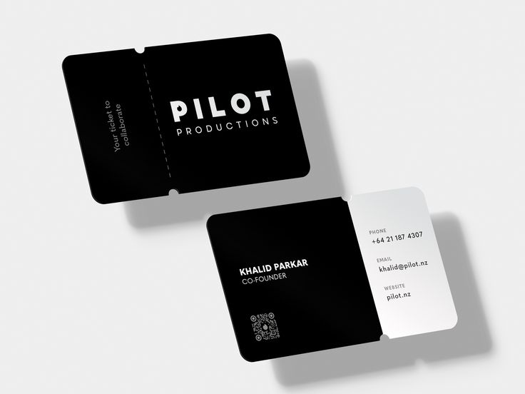 two black and white business cards sitting next to each other