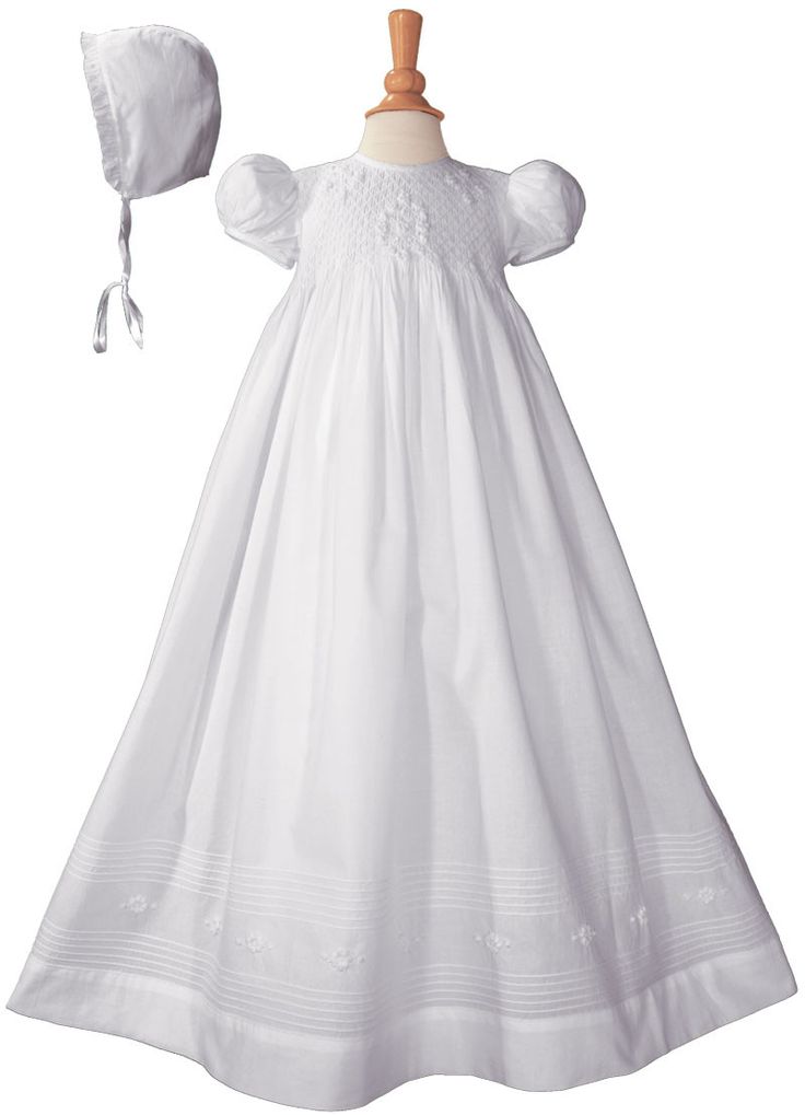 Details This beautiful all white christening/baptismal gown is perfect for any special occasion such a wedding, church presentation, dedication and keepsake photos. Beautifully smocked 32 inch heirloom christening gown with hand embroidery and pintucking on bodice and skirt. Sash at back of gown and stretch in smocking enables gown to fit several size babies. Includes matching bonnet and attached slip. Hand made using 100% Cotton broadcloth. Shipped with elegant padded hanger and zippered vinyl Fitted Baptism Dress For Wedding, Elegant Solid Color Baptism Dress, Elegant Baptism Dress In Solid Color, Classic White Baptism Dress For Church, Classic Fitted Baptism Gown, Classic Fitted Gown For Baptism, Elegant Baptism Dress, Classic Fitted Gown For First Communion, Classic White First Communion Dress