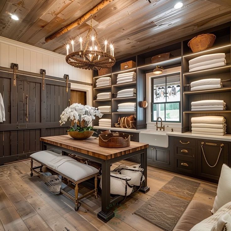 a room with lots of closets and shelves filled with white flowers in vases