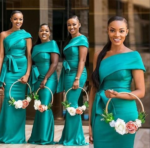 the bridesmaids are wearing different styles of dresses