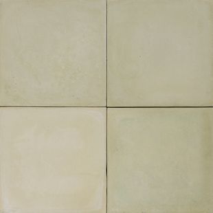 a white tiled wall with four square tiles