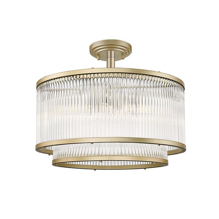 a semi flush light fixture with clear glass shades on the bottom and gold trimmings