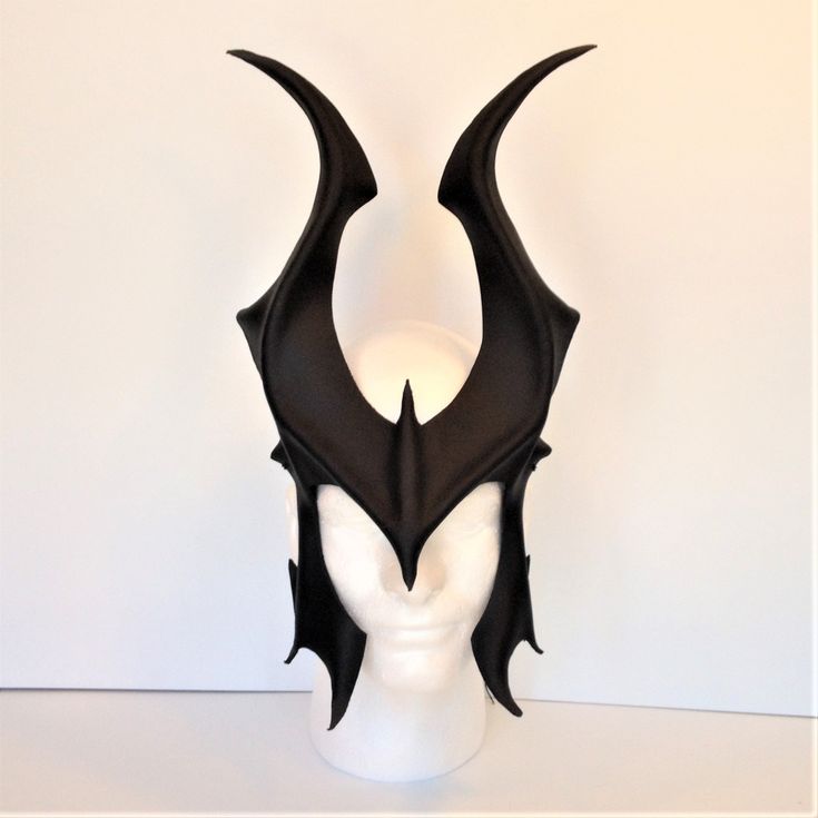 DESCRIPTIONTake control of the fantasy battlefield as the army's witch in a black leather horned headpiece! Great for fantasy festival or Halloween. Headpiece style avoids claustrophobia while wearing all day at convention or LARP event! Great for Halloween, Cosplay conventions, Renaissance Faire, SCA, dark fantasy costume, Disney villians Cosplay, or Maleficient fandom. Any color. Waterproofed leather, glossy or matte finish, & several choices to affix the mask (Standard black paracord, ela Warrior Costume Accessories For Larp And Halloween, Warrior Style Costume Accessories For Larp Halloween, Halloween Warrior Costume Accessories, Warrior Style Halloween Costume Accessories, Warrior Costume Accessories For Halloween, Warrior Style Costume Accessories For Halloween, Warrior Style Masks And Prosthetics For Larp And Halloween, Black Warrior Costume Accessories For Fantasy Events, Medieval Black Masks And Prosthetics For Fantasy Events