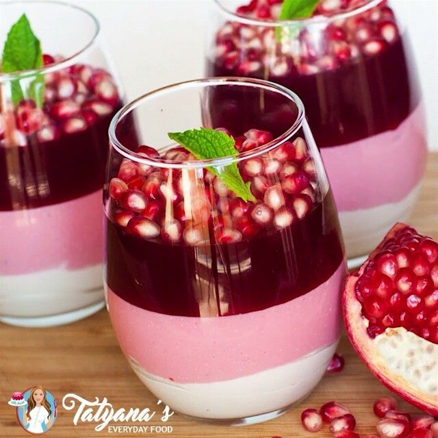 pomegranates are garnished with mint and served in small glasses