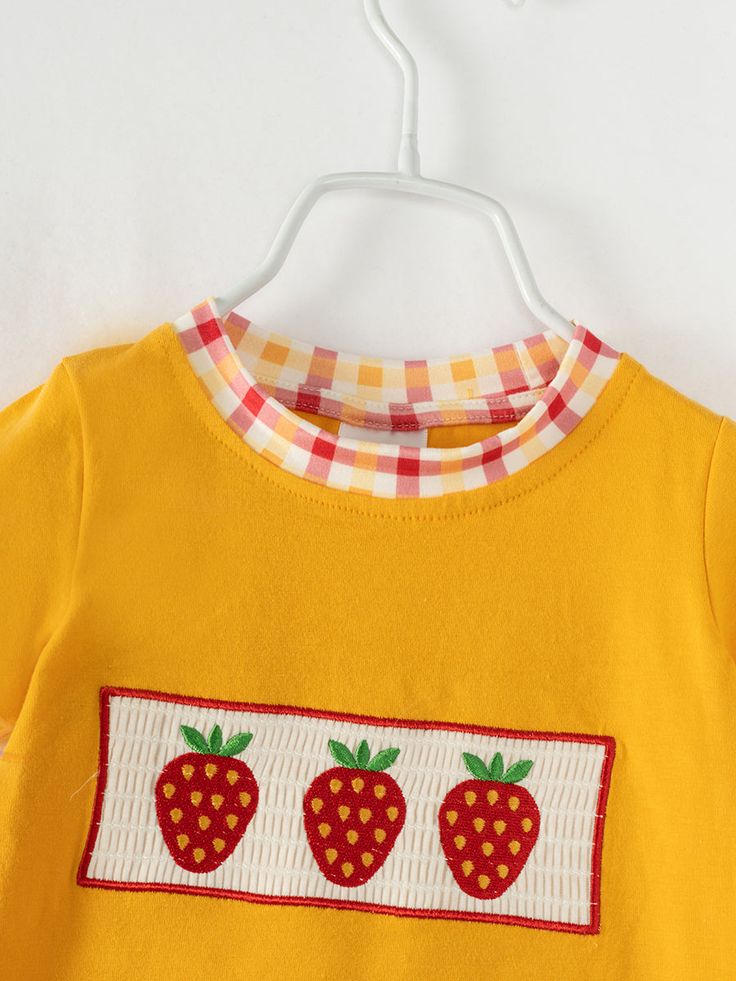 "Cute and comfy, our Yellow Strawberry Baby Boy Romper is perfect for your little one! Made from soft cotton for all-day comfort. Berry-licious style for your little cutie!" 97% Cotton, 3% Spandex Care instructions: Cold wash, gentle cycle, hang dry or tumble dry low inside out, do not bleach, do not iron. Playful Long Sleeve Onesie For Summer, Playful Long Sleeve Summer Onesie, Sweet Cotton Onesie For Summer, Sweet Summer Cotton Onesie, Stretch Cotton Onesie For Playwear, Cute Long Sleeve Summer Onesie, Sweet Cartoon Print Cotton Tops, Sweet Cotton Tops With Cartoon Print, Stretch Cotton Tops With Cartoon Print