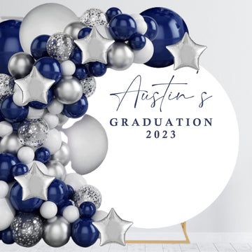 balloons and stars are arranged in the shape of a wreath for an graduation photo session