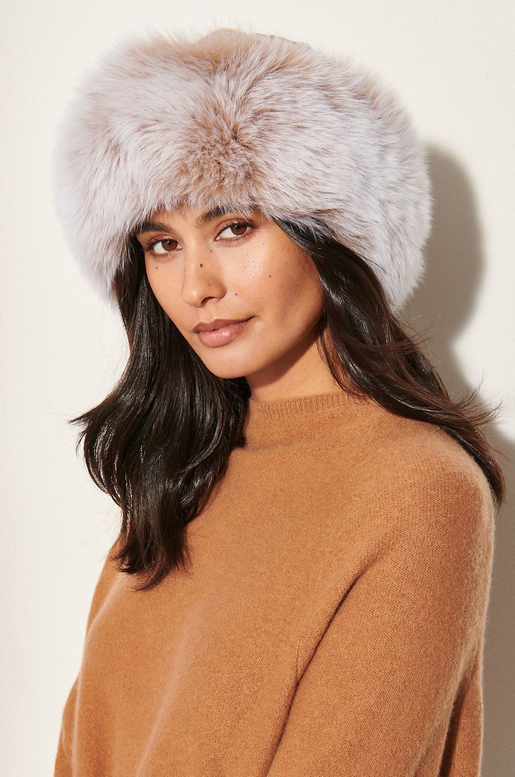 There isn't a more luxurious way to keep warm this winter. Slip on this silky mink hat for a lesson in elegance, and you won't ever take it off. Canadian sheared mink fur adorns the crown, while fluffy Finnish fox fur trim adds volume and pure decadence. The interior is comfy and warm, thanks to a soft, quilted polyester lining. Cossack Hat, Hats Cowboy, Mink Coats, Winter Fur Hat, Fur Keychain, Dinner Wear, Fur Hats, Leather Clothing, Faux Fur Hat