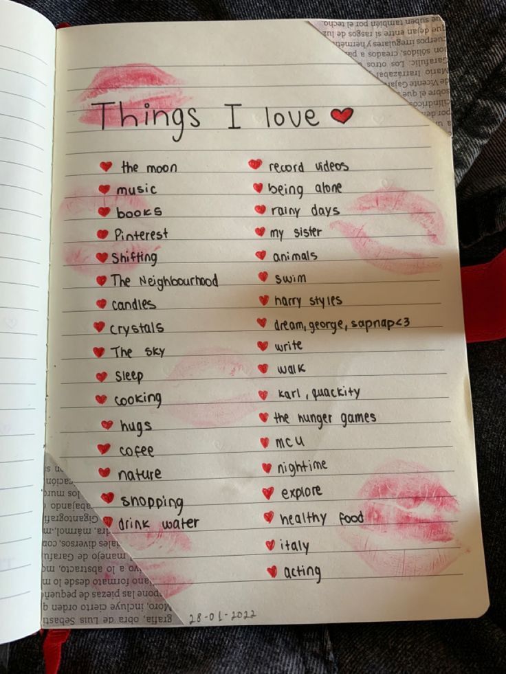 an open book with writing on it that says things i love in red and pink