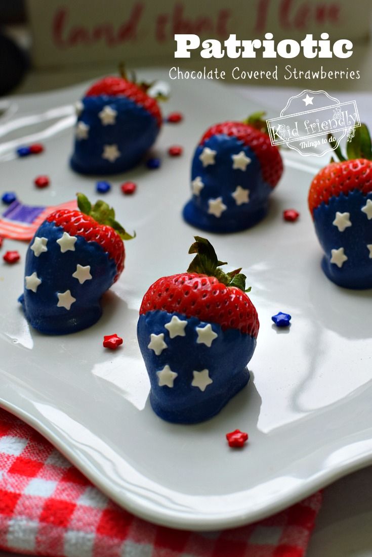 patriotic chocolate covered strawberries on a white plate