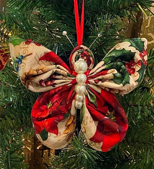 a christmas ornament hanging from a tree