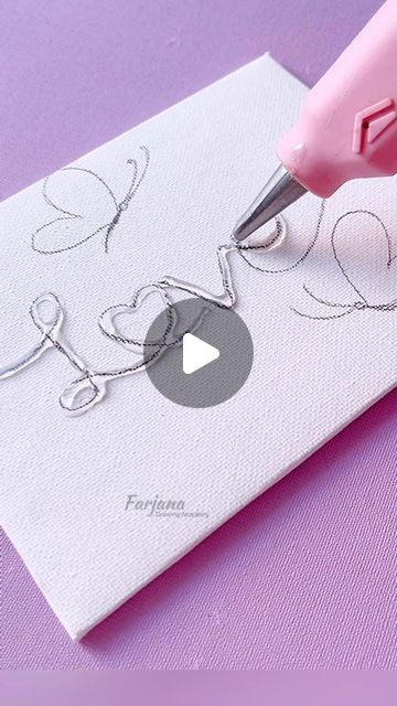 a video demonstrating how to draw hearts on fabric with a crochet stitcher