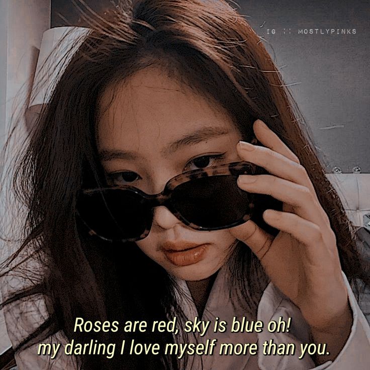 a woman holding up her sunglasses with the caption roses are red, sky is blue oh my daring i love myself more than you