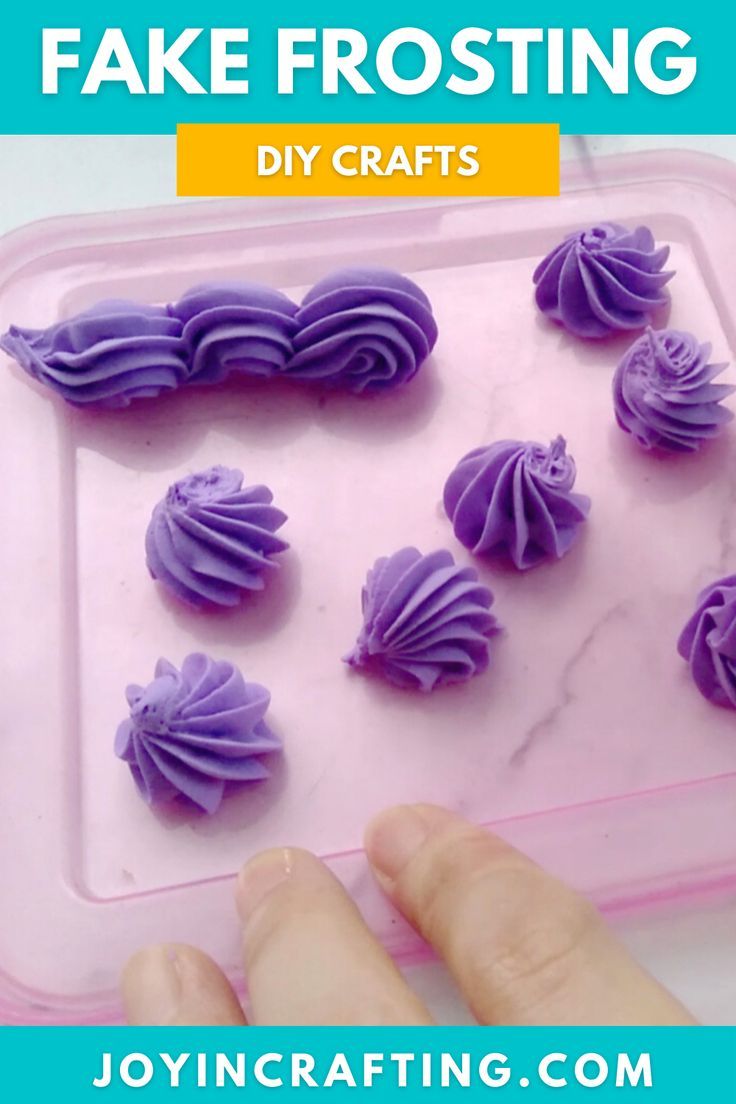 someone is making fake frosting with purple icing