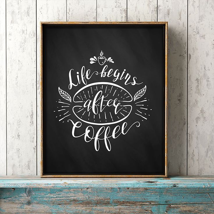 a framed chalkboard with the words life begins after coffee on it in front of a wooden wall