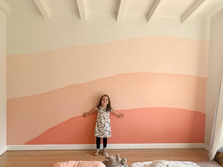 Inspiration comes to us in all forms 〰️ I painted this fun accent wall in my girls’ room and it added so much warmth to the space. Forever loving this tonal color palette! 🩷🍑🌸🍉🌺👚👄👛 #kidsfashion #handmadestyle #kidsstyle Toddler Accent Wall Girl, Toddler Girl Room Accent Wall, Girl Accent Wall Bedroom, Girl Room Color Palette, Girl Room Accent Wall, Paint Girls Room, Girls Accent Wall, Girls Room Accent Wall, Accent Wall Girls Bedroom