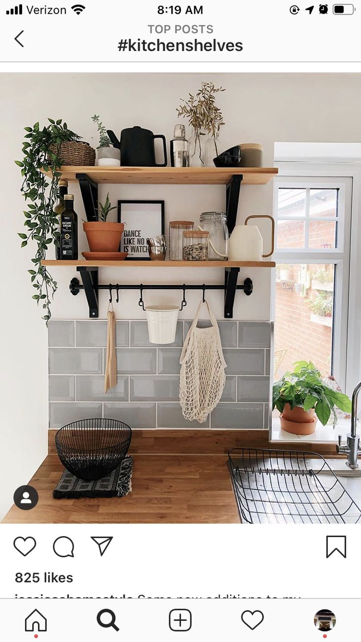 the kitchen is clean and ready to be used as a place for potted plants