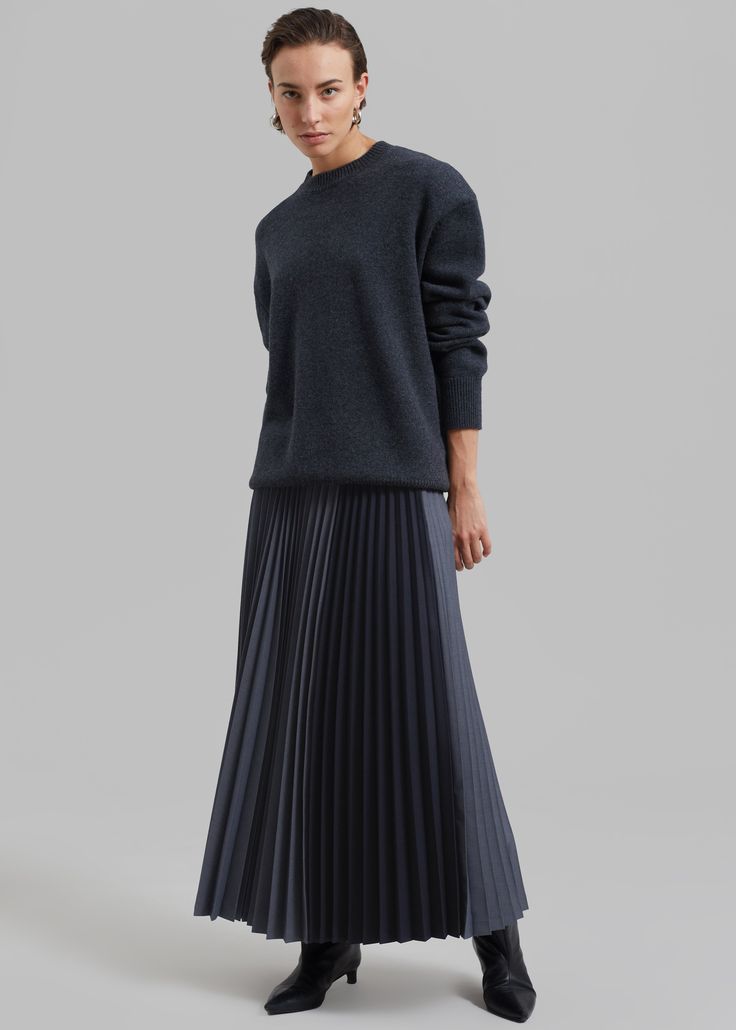 Color: Charcoal Midweight woven fabric Regular fit Maxi length Pleated detailing throughout Color block detailing Partially elasticated waist Side seam zip closure Partially lined 65% Tencel 28% Rayon 5% Wool 2% Elastane Dry Clean Imported Pleated Long Skirt Outfit, Long Pleated Skirt Outfit, Pleated Maxi Skirt Outfit, Skirt Boots Outfit, Pleated Skirt Outfit Ideas, Wool Skirt Outfit, Long Wool Skirt, Pleated Skirt Outfit, Ribbed Skirt