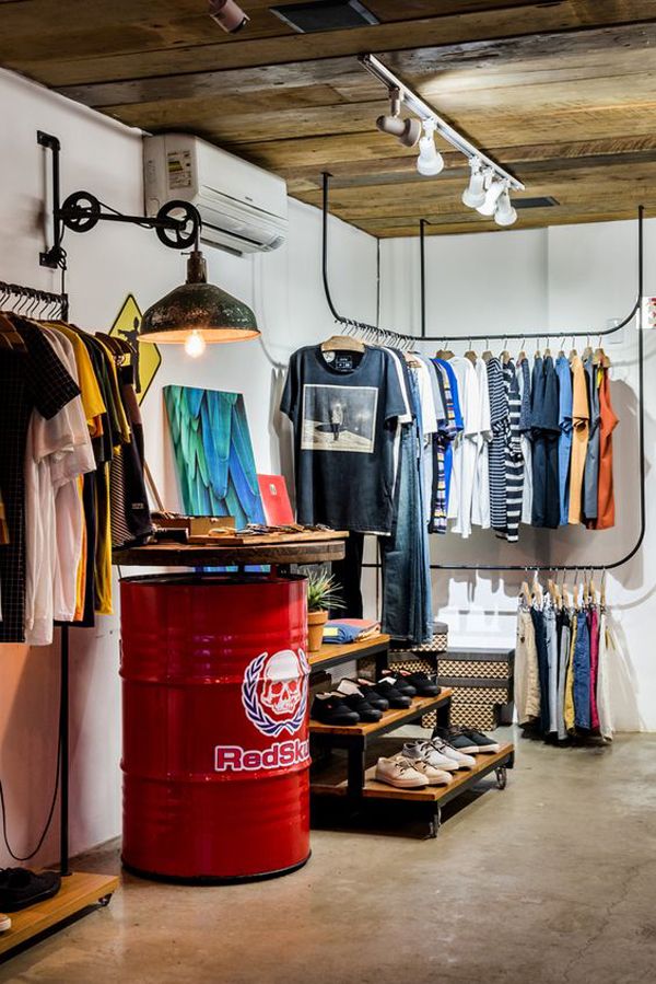 the inside of a clothing store with lots of items