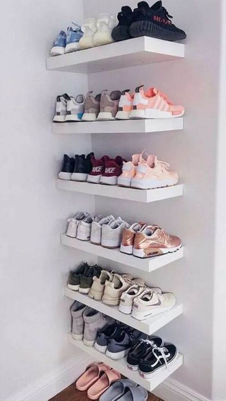 there are many pairs of shoes on the shelves