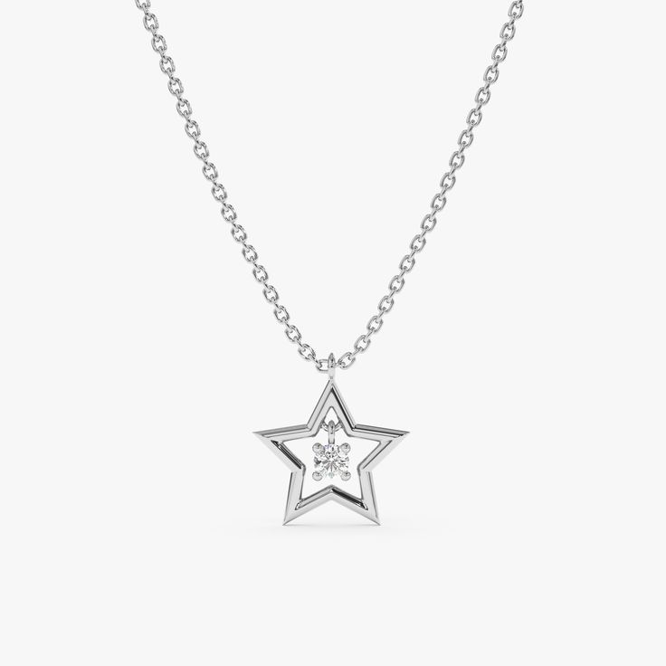 Skylar Let your inner glow shine bright with our exquisite 14k gold star necklace. This stunning necklace features a beautiful cutout star with a dangly white full-cut diamond. Choose your favorite among Yellow Gold, White Gold, and Rose Gold. - Handmade- Solid Gold- Natural Diamond - G Color, SI Quality Diamonds- Star Size: 10 mm- Total Diamond Carat Weight: 0.05 ctw All pieces come beautifully boxed in suede pouches you can always use when traveling! Christmas Proposal, Gold Star Necklace, Diamond Star Necklace, Star Necklace Gold, Star Charm Necklace, Inner Glow, Solid Gold Necklace, Star Pendant Necklace, Necklace For Her