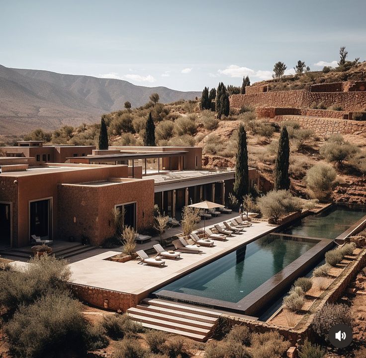 an aerial view of a house in the desert