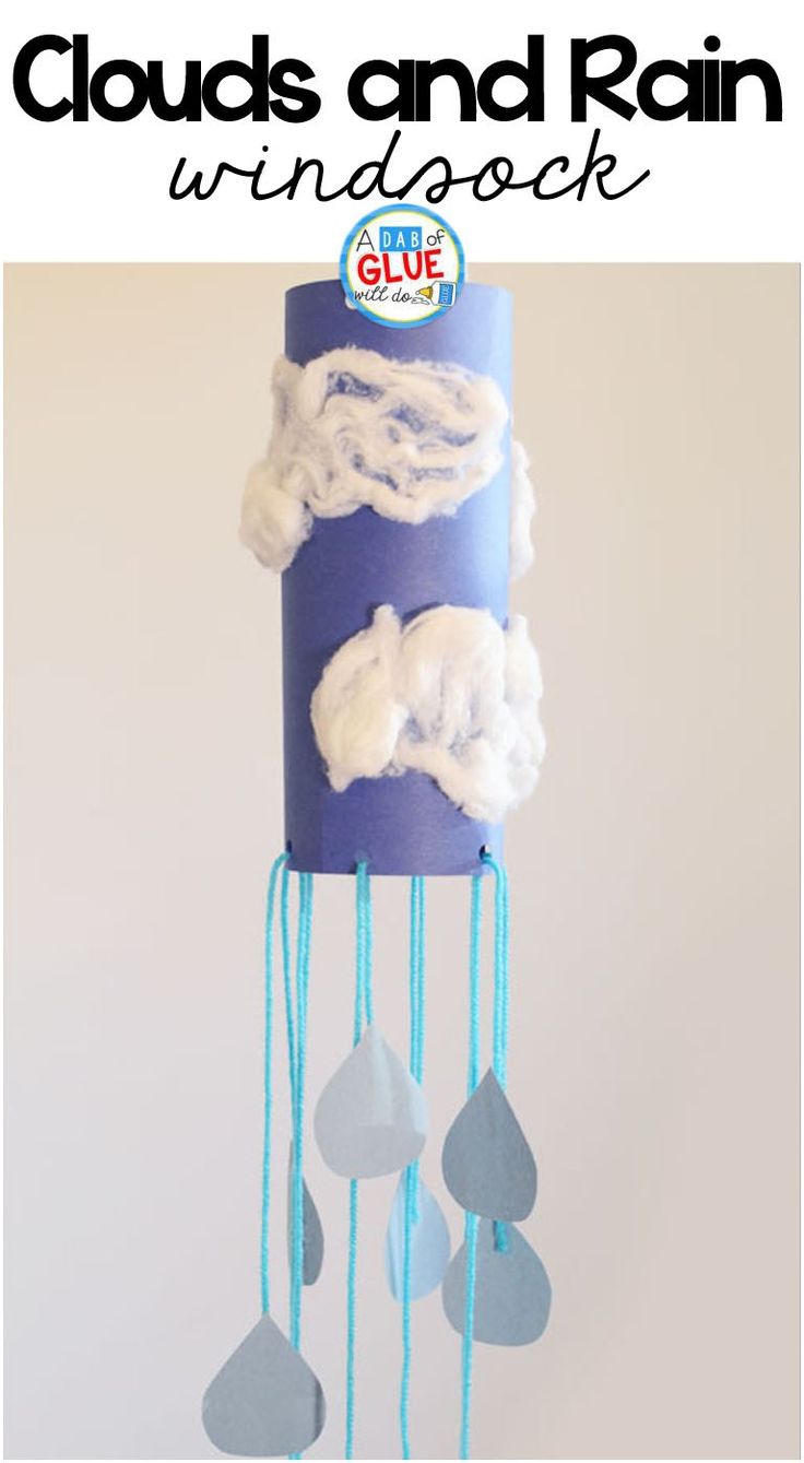 a wind chime made out of blue paper with clouds and rain drops