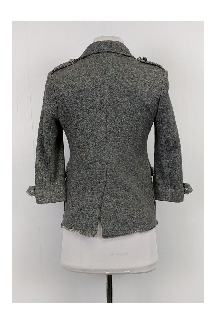 This chic blazer is made with a soft-to-the-touch fabric. It has a classic double breasted front with silver-tone buttons. Style it with skinny jeans and tall boots. Size XS 73% cotton, 23% acrylic, 4% polyester Collared 3/4 sleeves Double breasted front Silver-tone buttons Front pockets Bust 32" Waist 33" Shoulder to hem 22" Trendy Fitted Double-breasted Blazer, Trendy Fitted Pea Coat With Double Button Closure, Trendy Fitted Double-breasted Pea Coat, Fitted Trendy Blazer With Double Button Closure, Trendy Fitted Blazer With Double Button, Trendy Fitted Blazer With Double Button Closure, Trendy Fitted Outerwear With Double-breasted Button, Trendy Fitted Double-breasted Outerwear, Fitted Trendy Pea Coat For Work