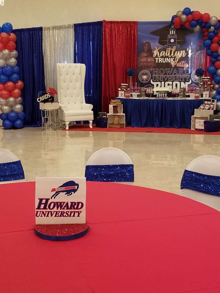 an event with balloons and decorations on the floor, including a sign that reads howard university