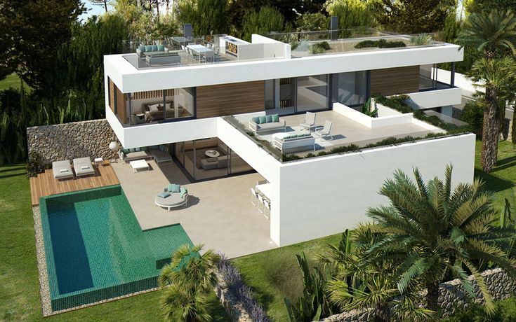 an aerial view of a modern house with pool