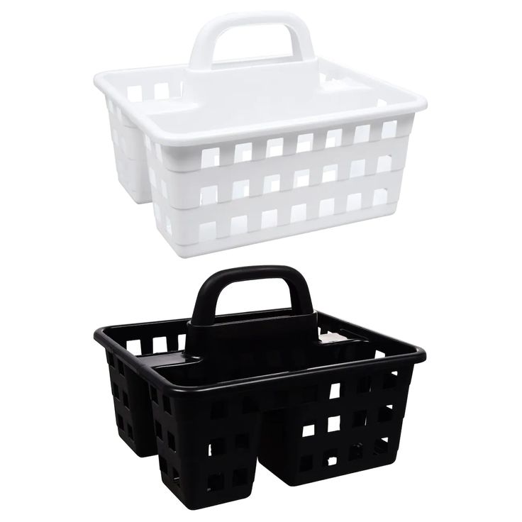 two black and white baskets sitting next to each other