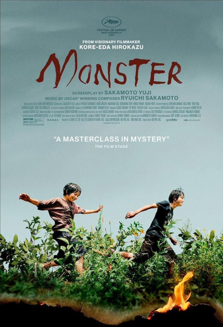 the movie poster for monster starring two young boys running through bushes with fire in front of them